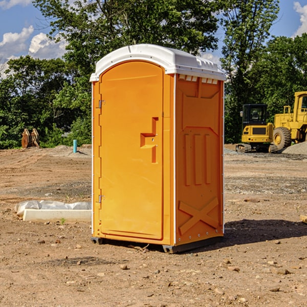 how often are the porta potties cleaned and serviced during a rental period in Mackinaw